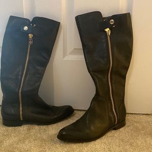 Tall black leather boots